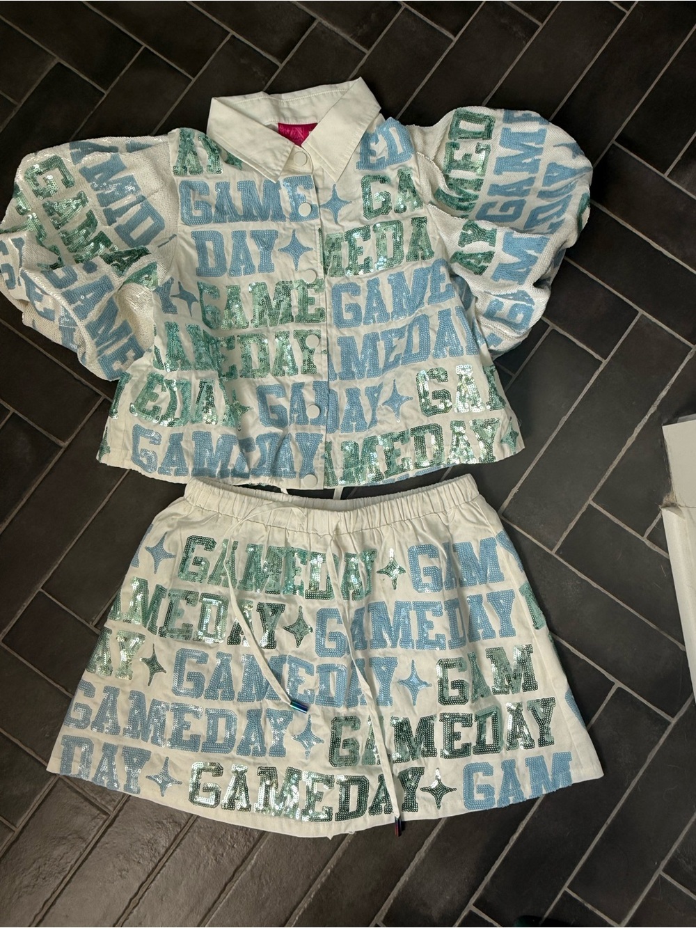 QUEEN OF SPARKLES White Top and Skirt Set with Blue and Green 'GAMEDAY' Print